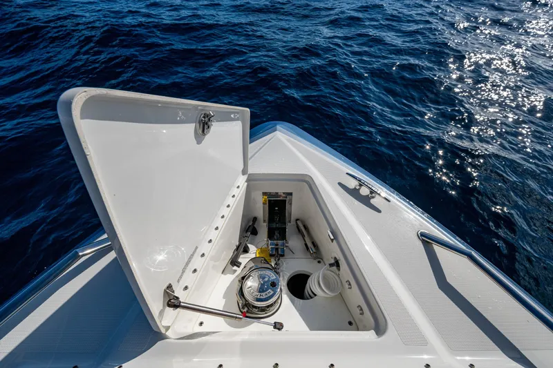 Yacht Photos Pics Open hatch on 2022 Formula 380 Super Sport Crossover OB, revealing anchor storage.