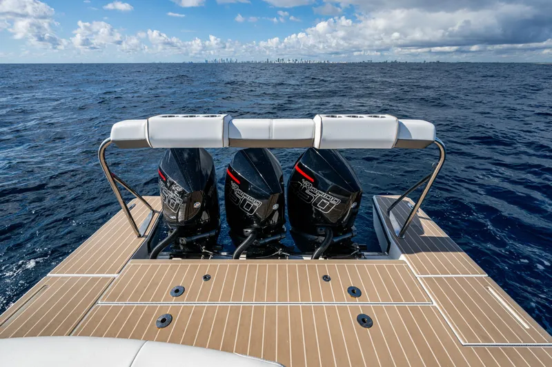  Yacht Photos Pics 2022 Formula 380 Super Sport Crossover OB with triple outboard engines on open sea.