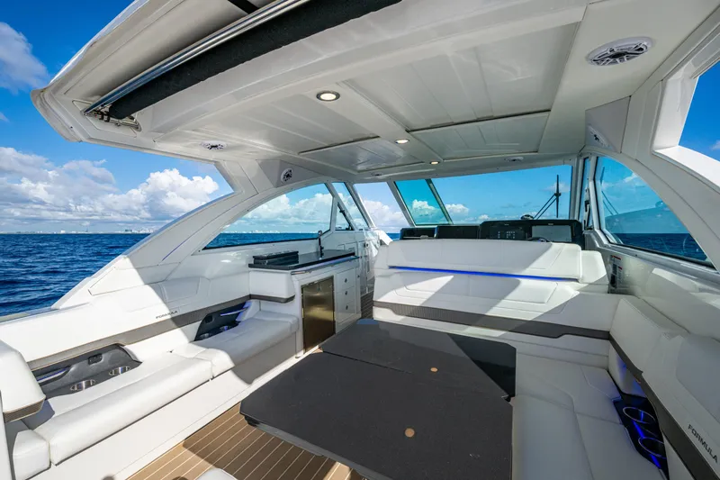  Yacht Photos Pics Luxurious interior of 2022 Formula 380 Super Sport Crossover OB yacht on open water.