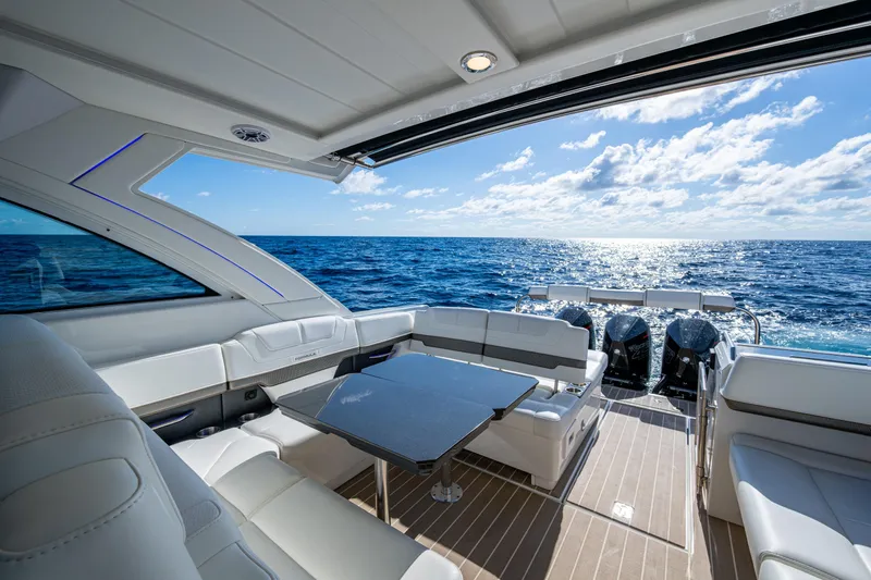  Yacht Photos Pics Luxurious 2022 Formula 380 Super Sport Crossover OB yacht interior with ocean view.