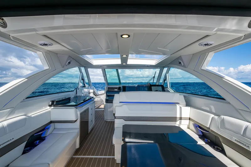  Yacht Photos Pics 2022 Formula 380 Super Sport Crossover OB interior with ocean view, featuring sleek design and modern amenities.
