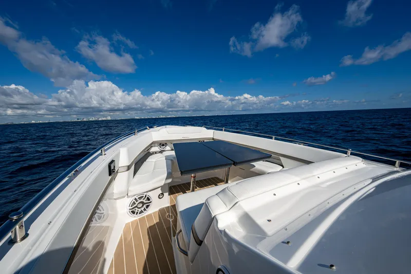  Yacht Photos Pics 2022 Formula 380 Super Sport Crossover OB on open sea under blue sky.