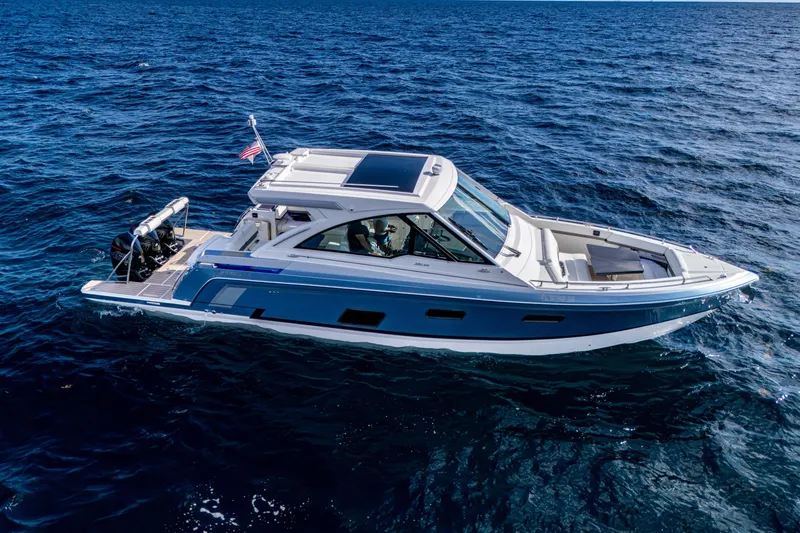  Yacht Photos Pics 2022 Formula 380 Super Sport Crossover OB cruising on open water.