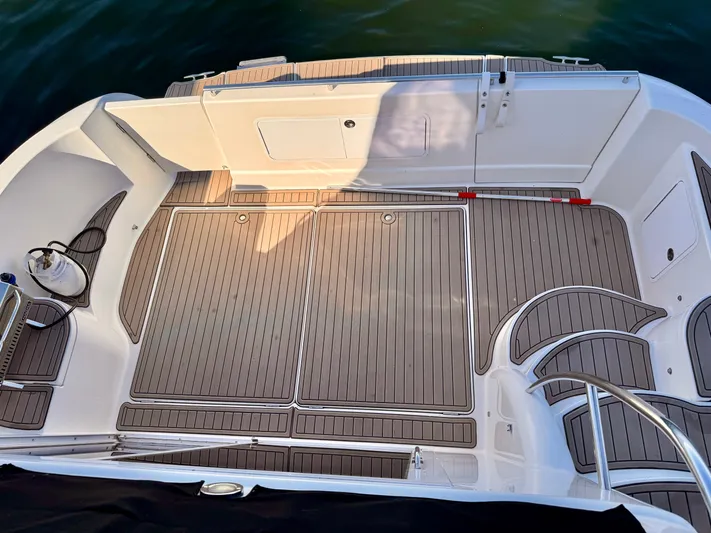  Yacht Photos Pics 2005 Meridian 459 CMY boat deck with teak flooring and stainless steel railings.