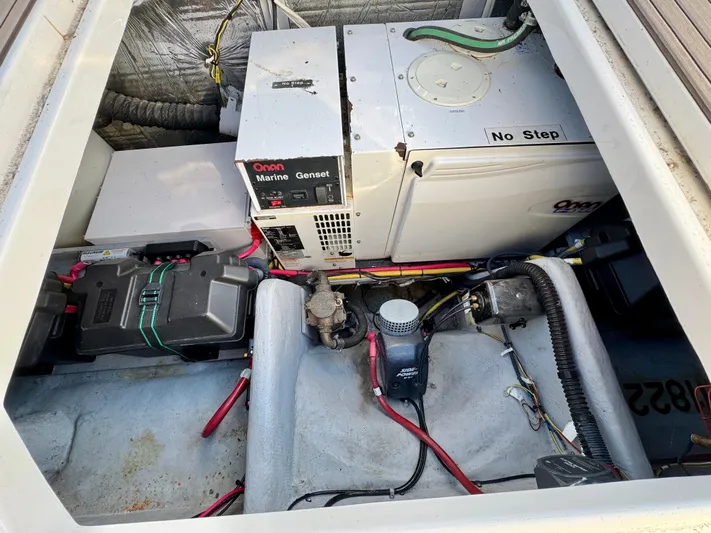  Yacht Photos Pics Engine compartment of 2005 Meridian 459 CMY with Onan marine generator and wiring.
