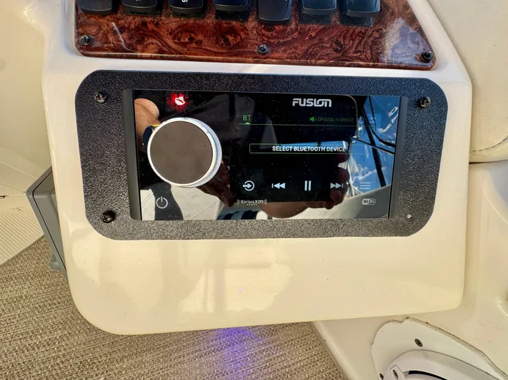  Yacht Photos Pics Control panel of a 2005 Meridian 459 CMY boat with Fusion audio system.