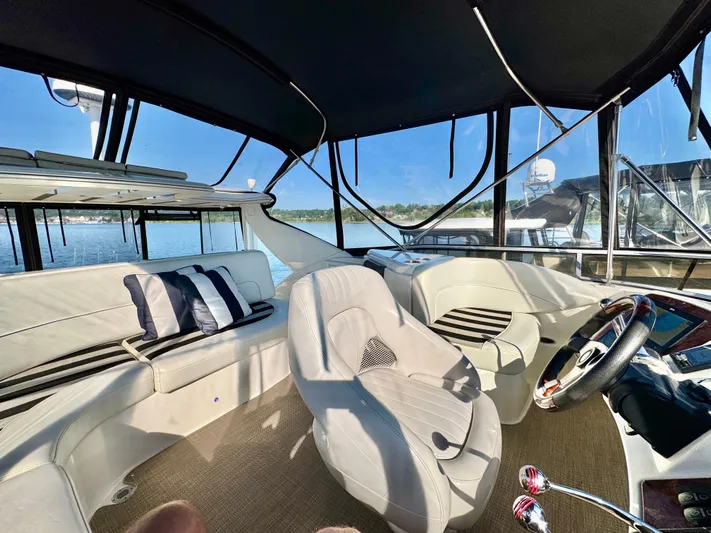  Yacht Photos Pics Luxurious 2005 Meridian 459 CMY yacht interior with plush seating and scenic water views.
