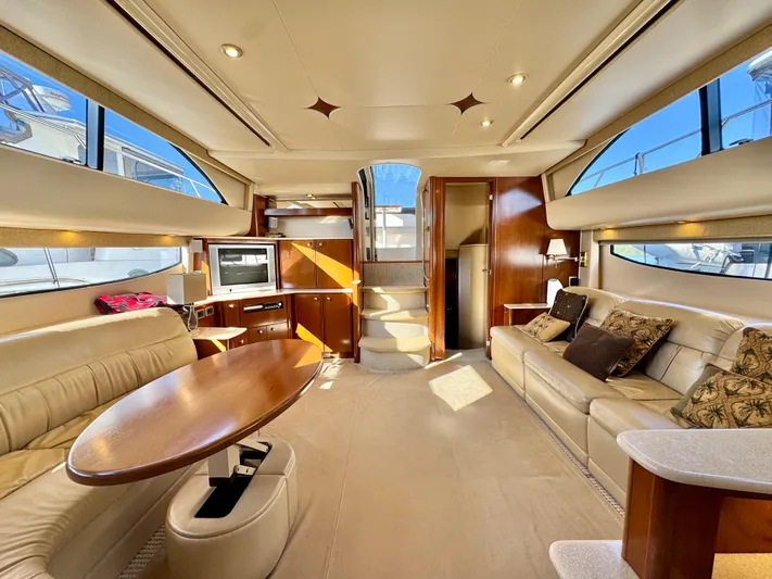  Yacht Photos Pics Luxurious interior of 2005 Meridian 459 CMY yacht with elegant seating and modern amenities.