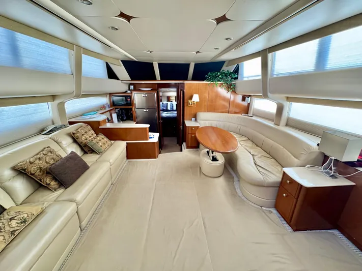  Yacht Photos Pics Luxurious interior of a 2005 Meridian 459 CMY yacht with plush seating and modern amenities.