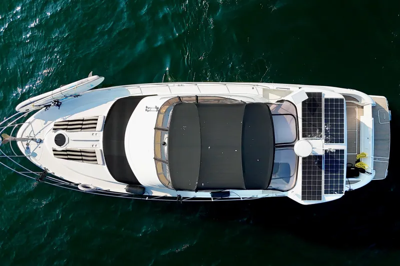  Yacht Photos Pics Aerial view of 2005 Meridian 459 CMY yacht with solar panels on deck.