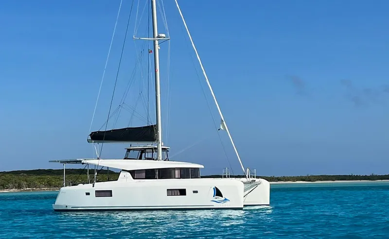 Always Sunday Yacht Photos Pics 2020 Lagoon 42 catamaran sailing on clear blue waters.