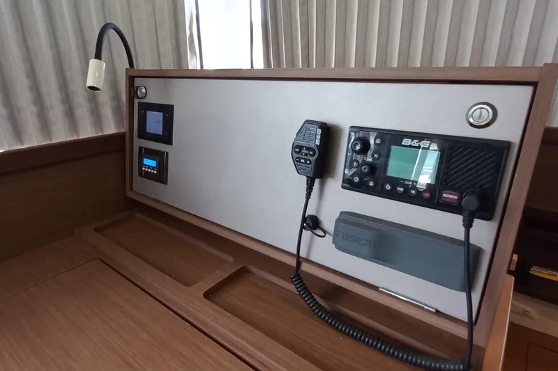 Always Sunday Yacht Photos Pics Control panel of 2020 Lagoon 42 yacht with communication equipment and modern design.