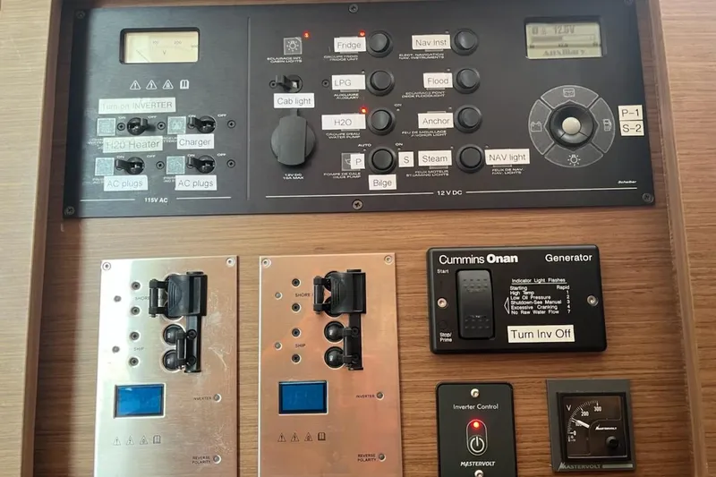 Always Sunday Yacht Photos Pics Control panel of a 2020 Lagoon 42 yacht with various switches and indicators.