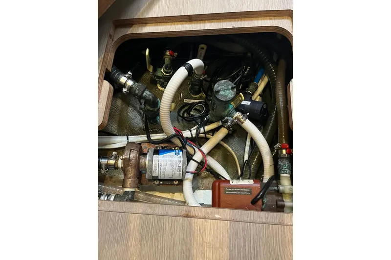 Always Sunday Yacht Photos Pics Bilge compartment of 2020 Lagoon 42 yacht with various hoses and pumps.