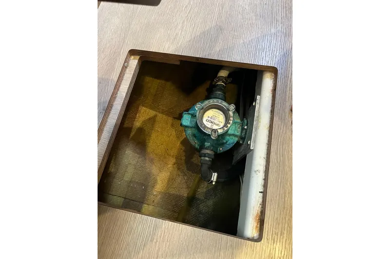 Always Sunday Yacht Photos Pics Inspection hatch on Lagoon 42 catamaran, revealing a mechanical component, 2020 model.