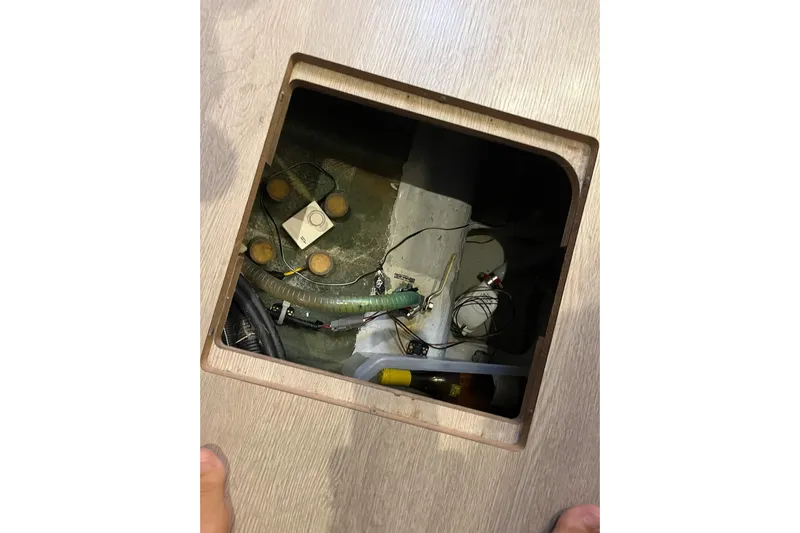 Always Sunday Yacht Photos Pics Access hatch on Lagoon 42 catamaran, revealing wiring and components, 2020 model.