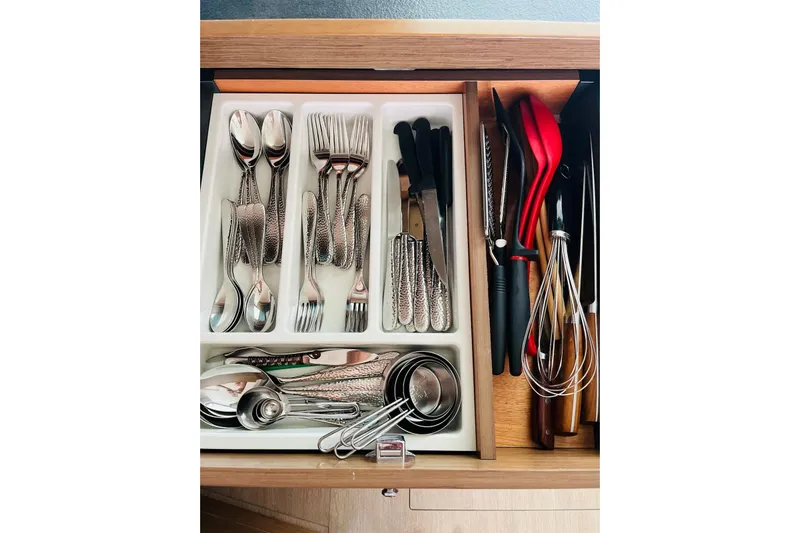 Always Sunday Yacht Photos Pics Kitchen drawer with organized cutlery and utensils on a Lagoon 42, 2020 model.