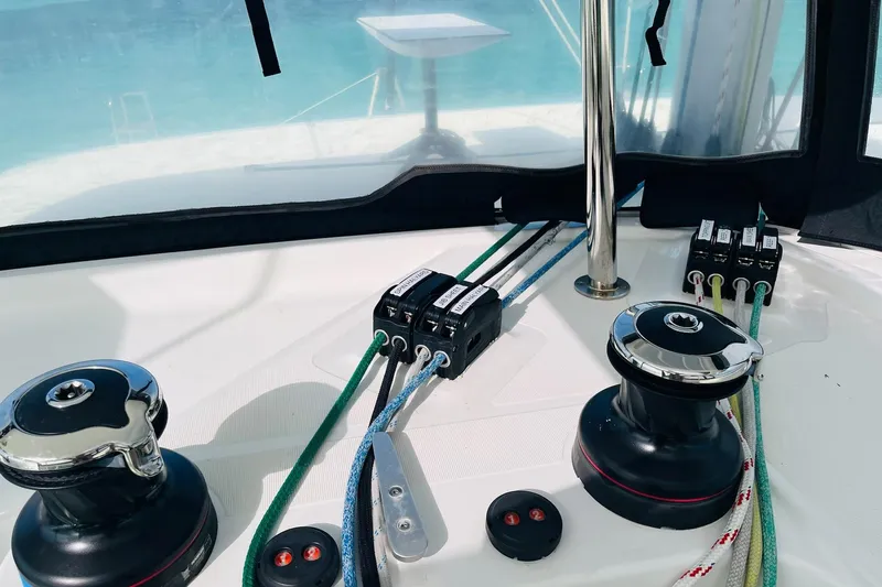 Always Sunday Yacht Photos Pics Control panel of a 2020 Lagoon 42 catamaran with winches and ropes.