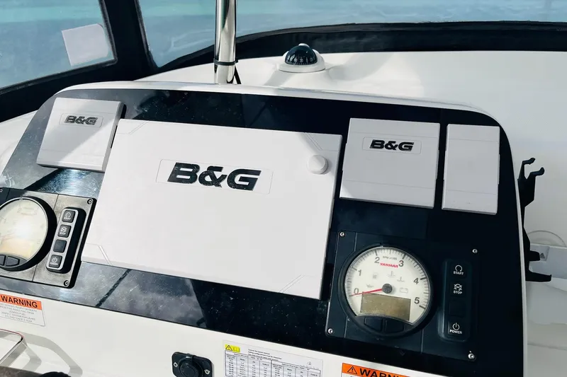 Always Sunday Yacht Photos Pics Control panel of a 2020 Lagoon 42 catamaran featuring B&G navigation equipment.