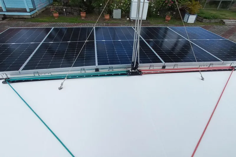 Always Sunday Yacht Photos Pics Solar panels on a 2020 Lagoon 42 catamaran deck, with rigging lines visible.