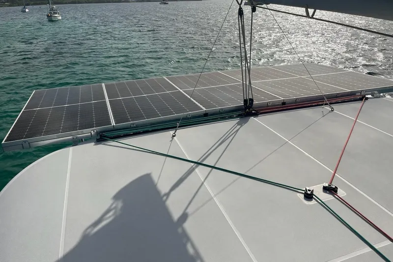 Always Sunday Yacht Photos Pics Solar panels on a 2020 Lagoon 42 catamaran, sailing on calm waters.