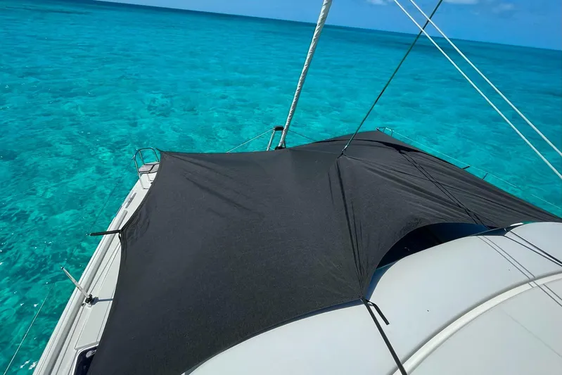 Always Sunday Yacht Photos Pics Lagoon 42 catamaran sailing on clear turquoise waters, 2020 model.