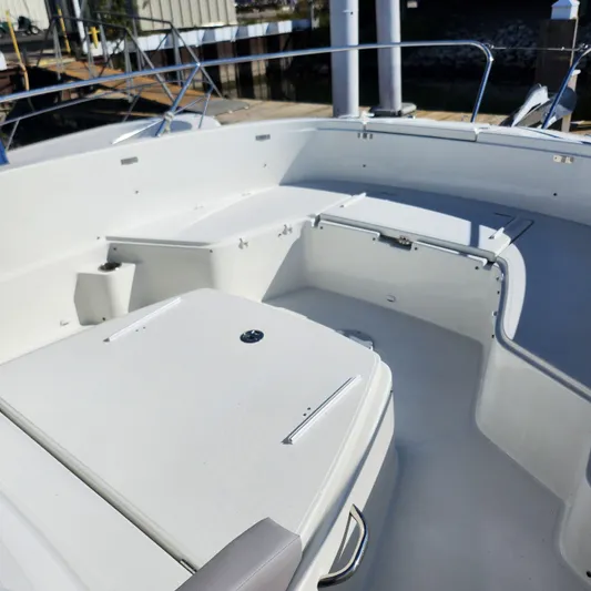 Hanolei Yacht Photos Pics 2021 Jeanneau 9.0 CC boat interior with spacious seating and sleek design.