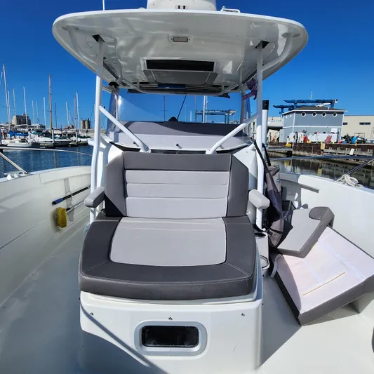 Hanolei Yacht Photos Pics 2021 Jeanneau 9.0 CC boat interior with seating, docked at marina.