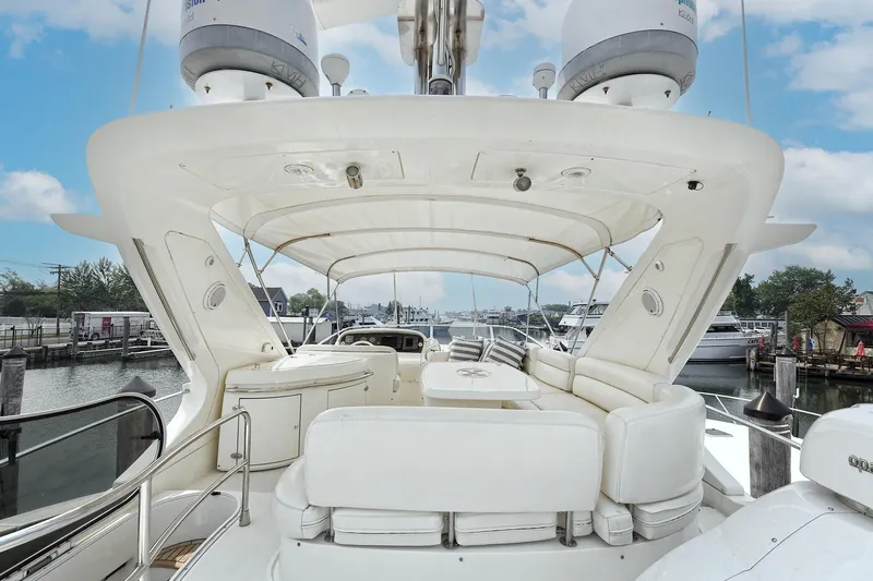  Yacht Photos Pics Luxurious 2003 Azimut 62 yacht with spacious deck and elegant seating.