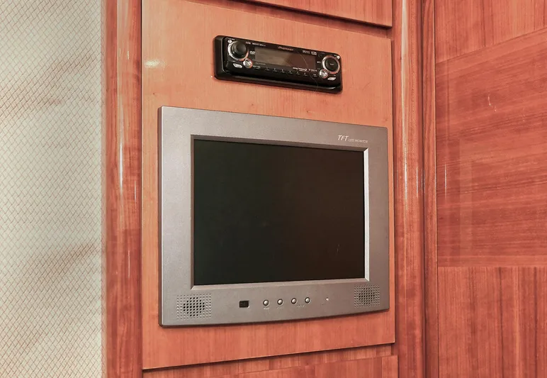  Yacht Photos Pics Built-in screen and stereo system on 2003 Azimut 62 yacht interior.