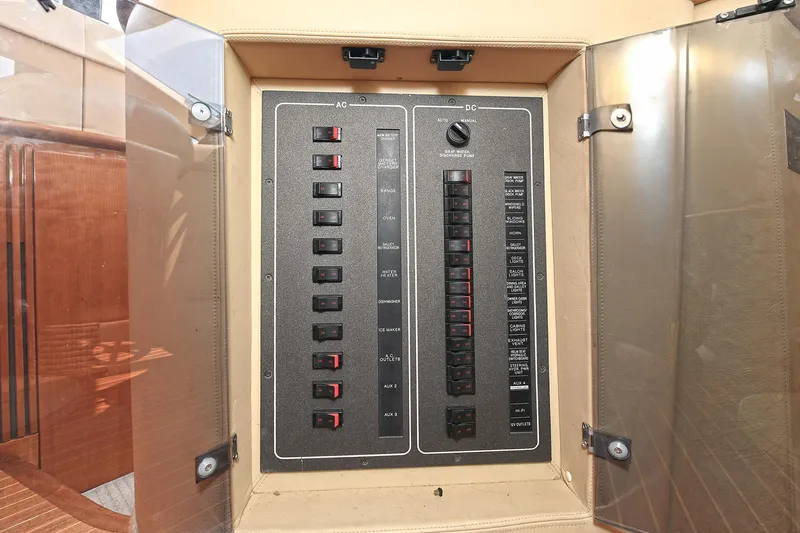  Yacht Photos Pics Electrical panel on a 2003 Azimut 62 yacht, featuring AC and DC switches.