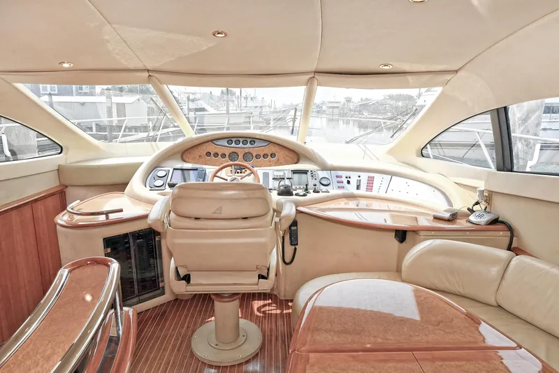  Yacht Photos Pics Luxurious 2003 Azimut 62 yacht interior with elegant helm and panoramic windows.
