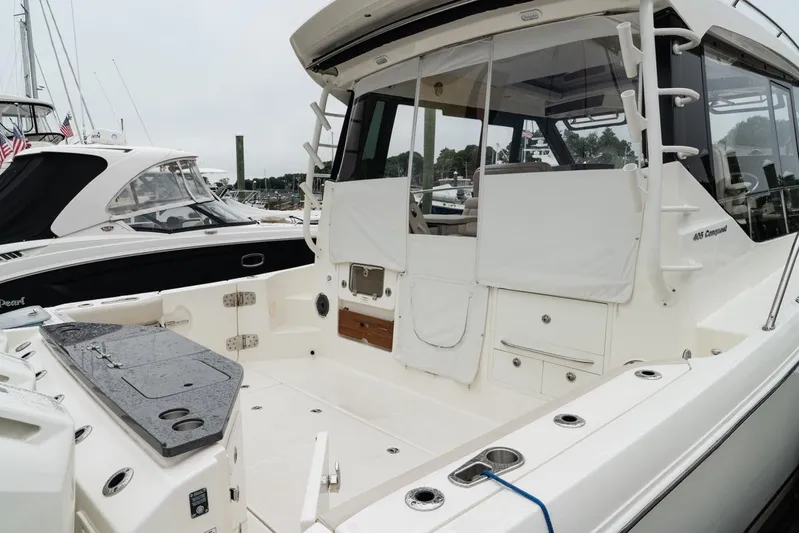  Yacht Photos Pics 2024 Boston Whaler 405 Conquest boat, featuring spacious deck and modern amenities.