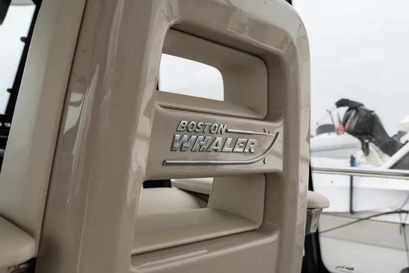  Yacht Photos Pics 2024 Boston Whaler 405 Conquest logo on boat interior, showcasing luxury design.