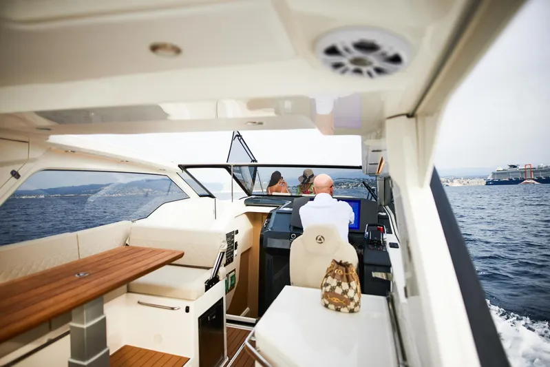  Yacht Photos Pics 2025 Skamander Sorrento yacht interior with passengers cruising on open water.