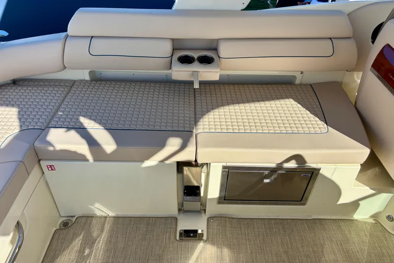  Yacht Photos Pics 2026 Chris-Craft Launch 31 GT interior seating with quilted upholstery and built-in storage.