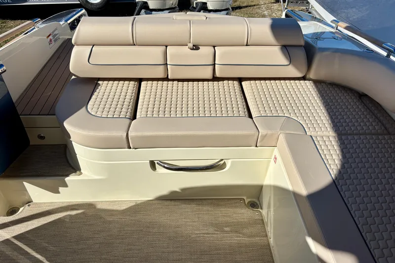  Yacht Photos Pics 2026 Chris-Craft Launch 31 GT boat interior with beige cushioned seating.