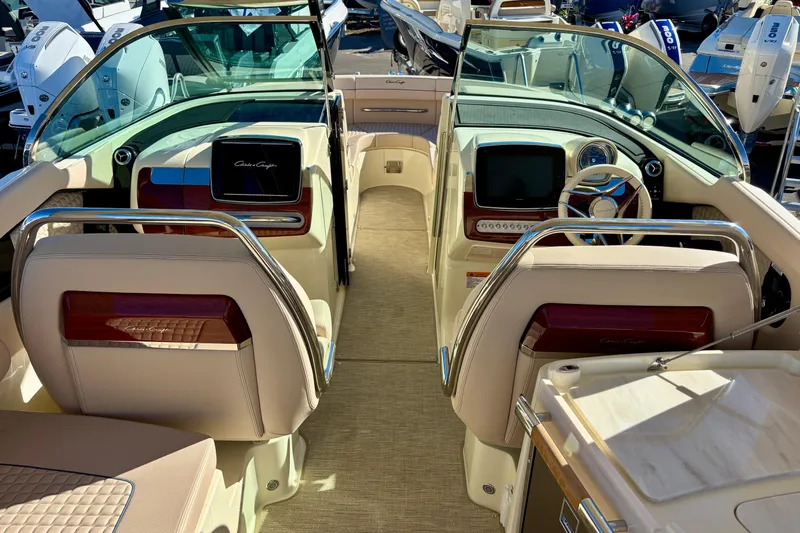  Yacht Photos Pics 2026 Chris-Craft Launch 31 GT interior with luxurious seating and modern dashboard.