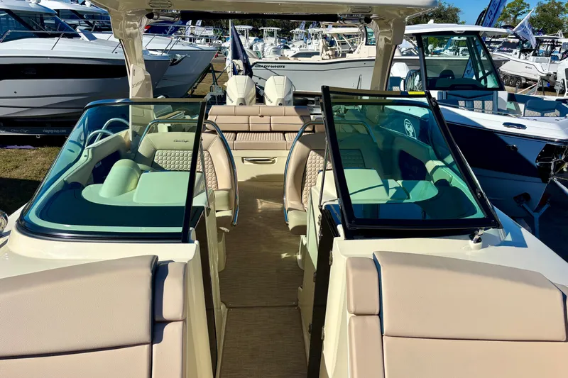  Yacht Photos Pics 2026 Chris-Craft Launch 31 GT luxury boat interior with seating and dashboard view.