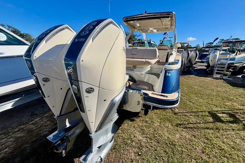 Yacht Photos Pics 2026 Chris-Craft Launch 31 GT boat with dual outboard engines, displayed outdoors.