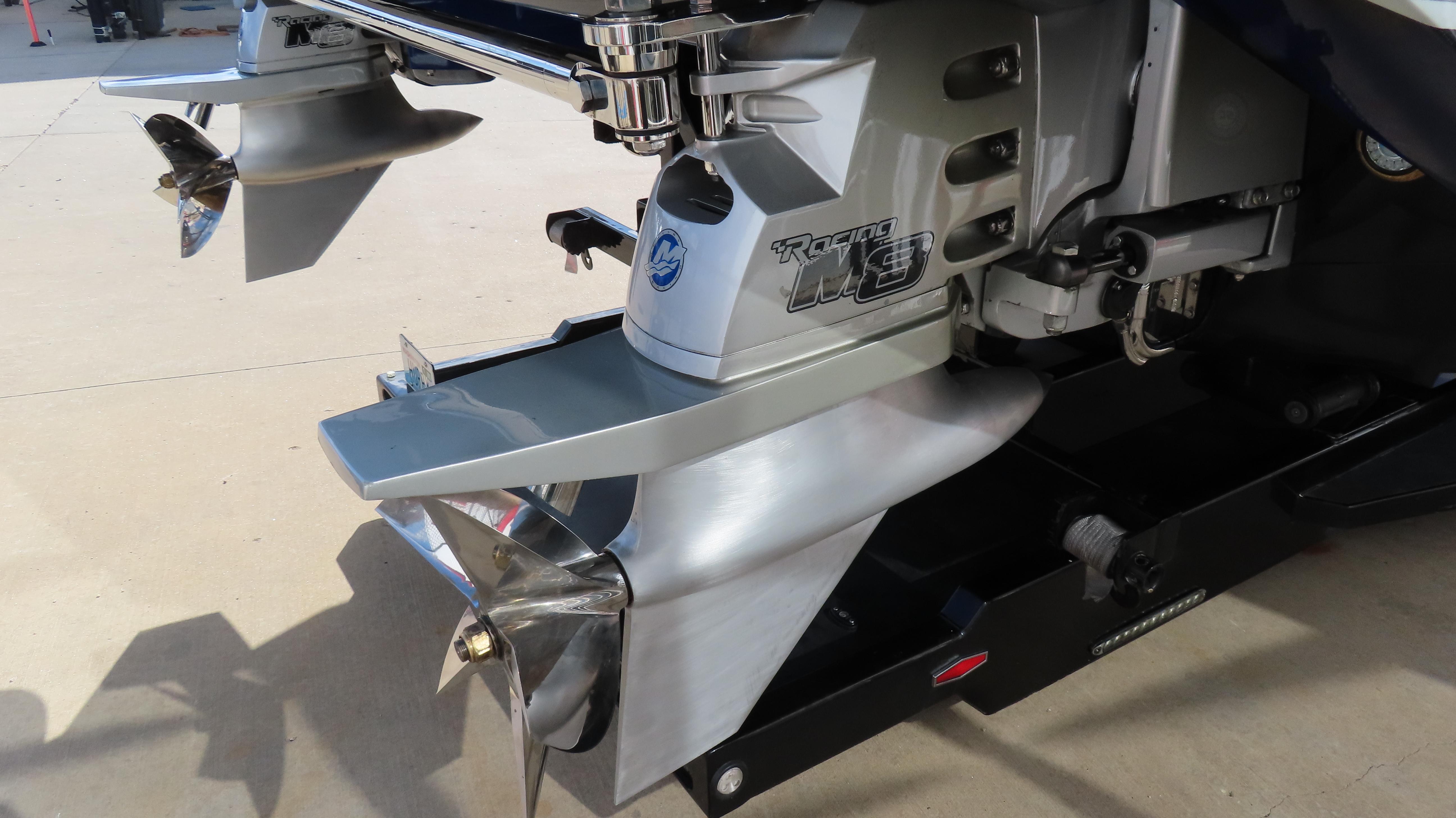 Close-up of 2020 Outerlimits 46SC boat's propeller and stern drive.