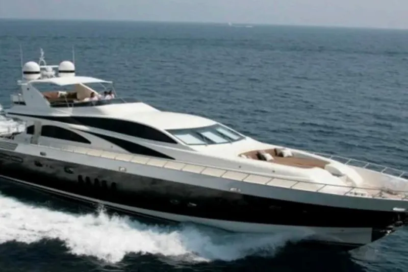  Yacht Photos Pics Luxurious 2008 Leopard 105 yacht cruising on open sea.