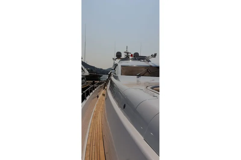  Yacht Photos Pics Luxury Leopard 105 yacht from 2008, featuring sleek design and wooden deck.