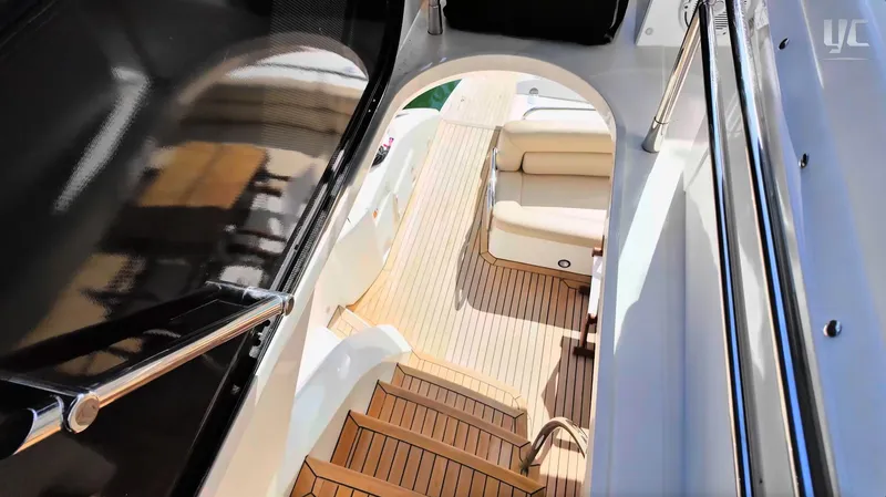 Phantom Yacht Photos Pics Luxurious Sunseeker Manhattan 63 yacht interior with wooden deck and seating, 2011 model.
