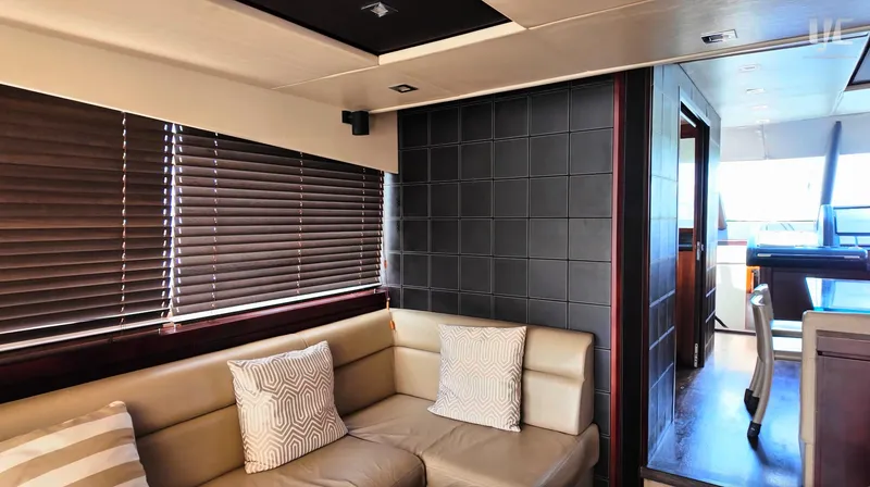 Phantom Yacht Photos Pics Luxurious interior of 2011 Sunseeker Manhattan 63 yacht with modern decor and comfortable seating.