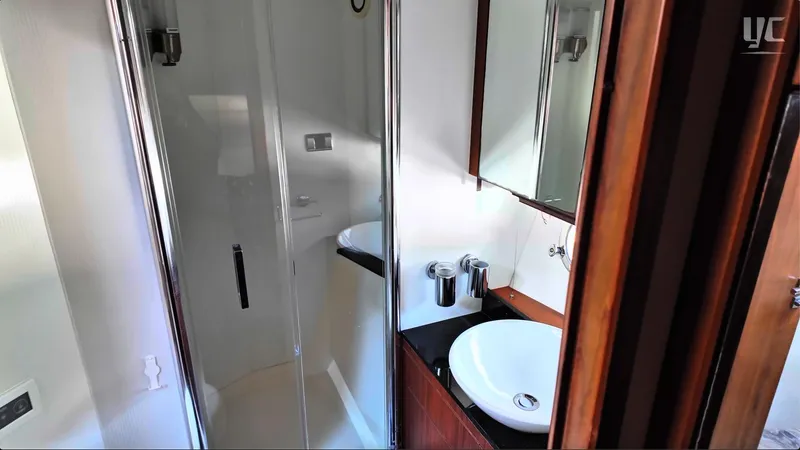 Phantom Yacht Photos Pics Bathroom interior of 2011 Sunseeker Manhattan 63 yacht with modern fixtures.