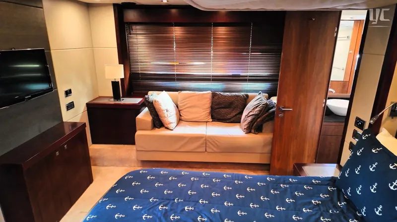 Phantom Yacht Photos Pics Luxurious interior of 2011 Sunseeker Manhattan 63 yacht with cozy seating and elegant decor.