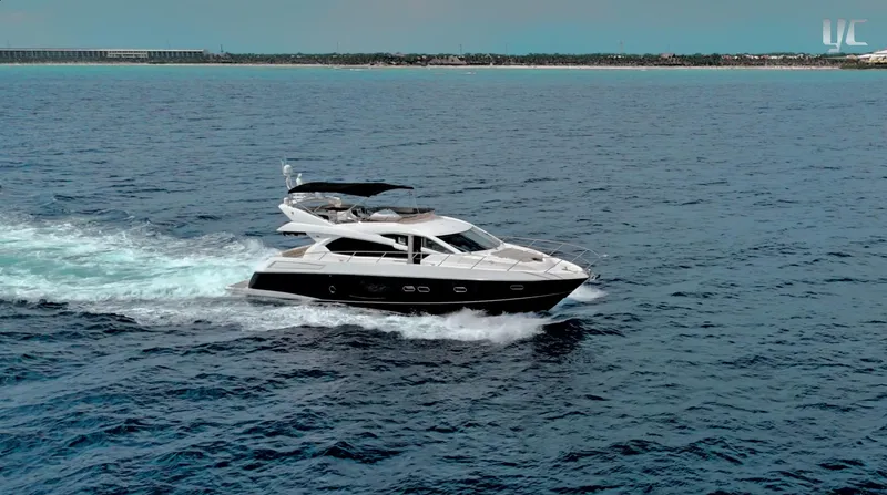 Phantom Yacht Photos Pics Luxury Sunseeker Manhattan 63 yacht cruising on open sea, 2011 model.