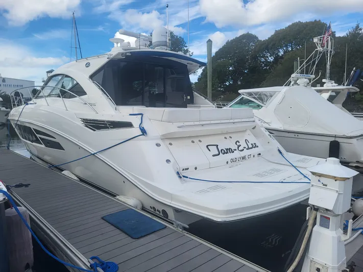Tam- E- Lee Yacht Photos Pics 2013 Sea Ray 510 Sundancer yacht docked at marina under blue sky.