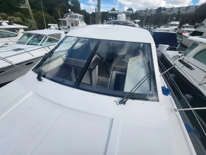 Tam- E- Lee Yacht Photos Pics 2013 Sea Ray 510 Sundancer yacht docked at marina, front view.